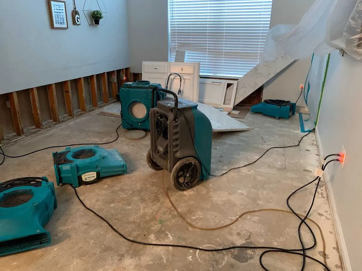 Dehumidifier in flood-cut room for Water Damage Restoration in Milton